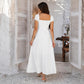 Back view of white square-neck bubble-sleeve French midi dress with puff sleeves
