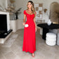 Women’s red French dress with bubble sleeves, square neckline, and gathered bodice