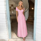 Women's pink puff-sleeve French dress with square neckline and full flowing skirt