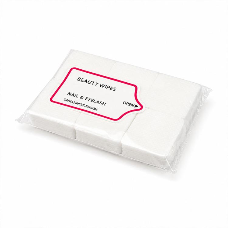 Disposable nail and eyelash wipes pack of folded white cleaning pads