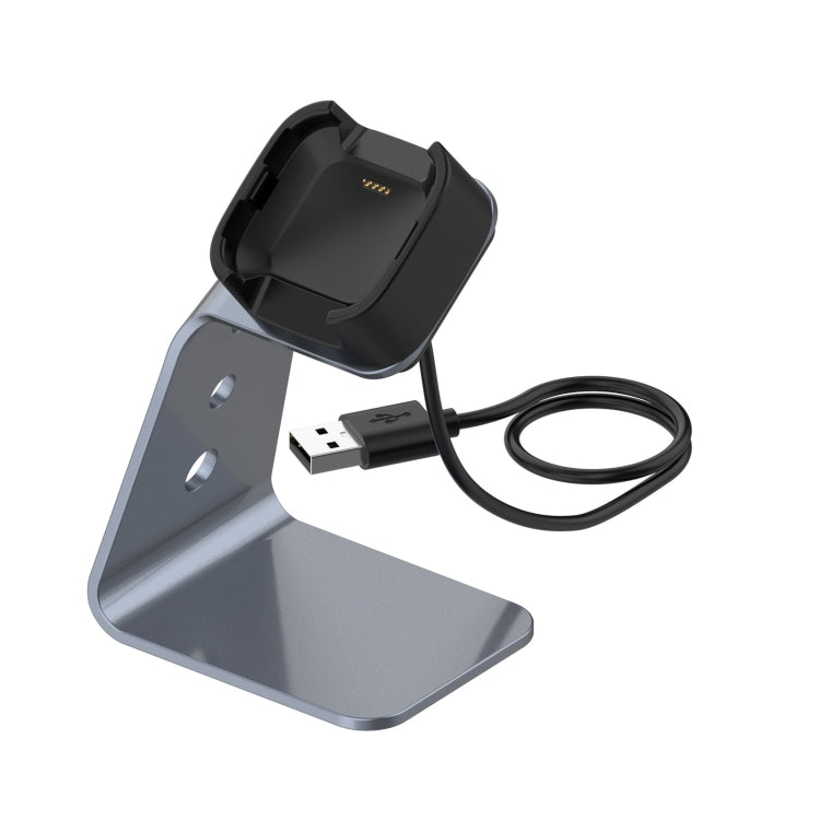 Grey aluminum smartwatch charger holder with black dock and USB charging cable