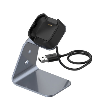 Grey aluminum smartwatch charger holder with black dock and USB charging cable