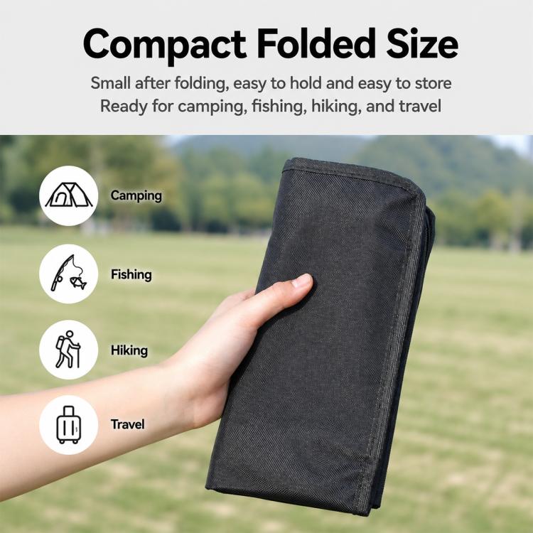 Compact black zippered storage bag for a folded chair, standing upright