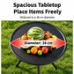 Round black camping table with wide tabletop for holding fruit