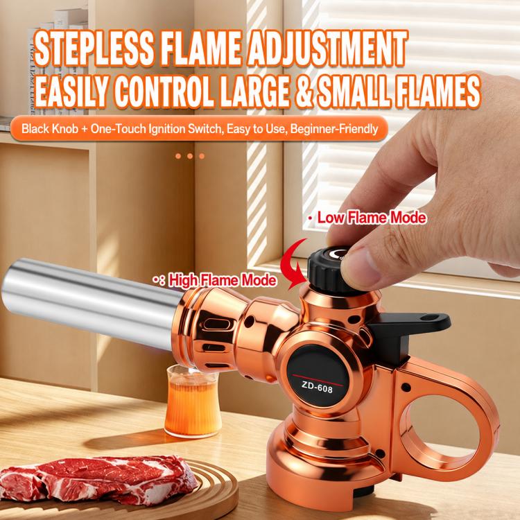Copper gas flamethrower nozzle with black flame control knob being adjusted by a hand