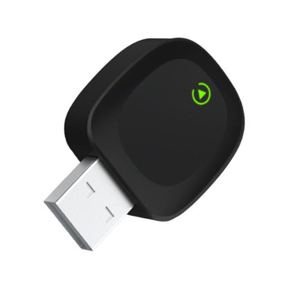 Black wireless car adapter with USB plug and green power icon, compact design