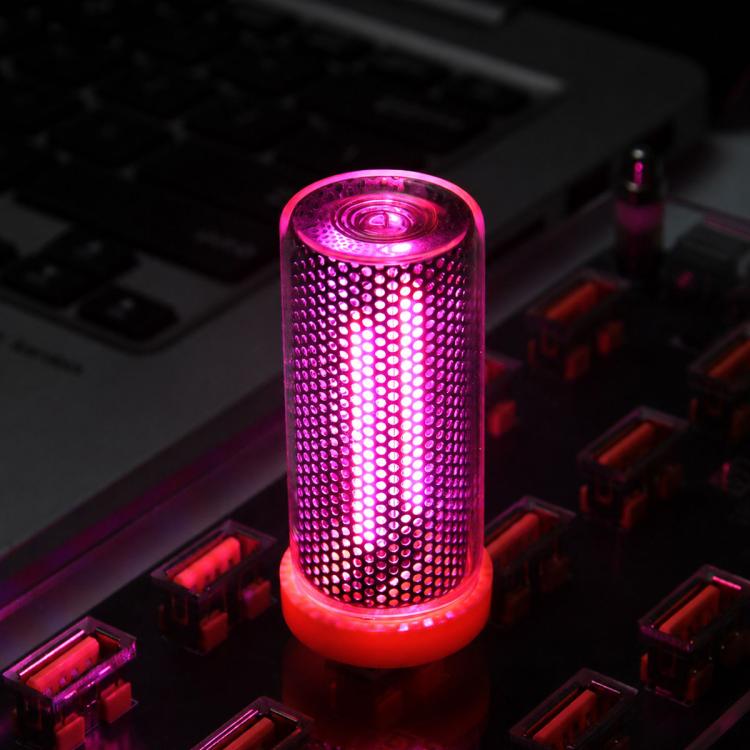 Pink glowing USB LED cylinder atmosphere light with dotted side grille