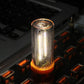 Warm white glowing USB LED cylinder atmosphere light with dotted side grille