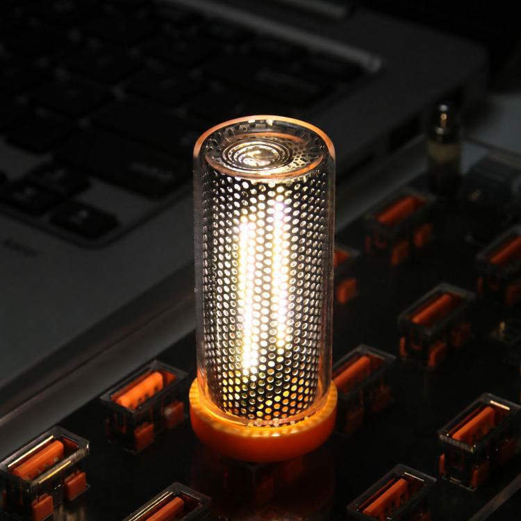 Warm white glowing USB LED cylinder atmosphere light with dotted side grille
