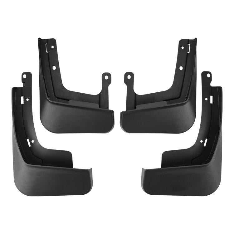 Set of four black molded mud flaps with drilled mounting tabs
