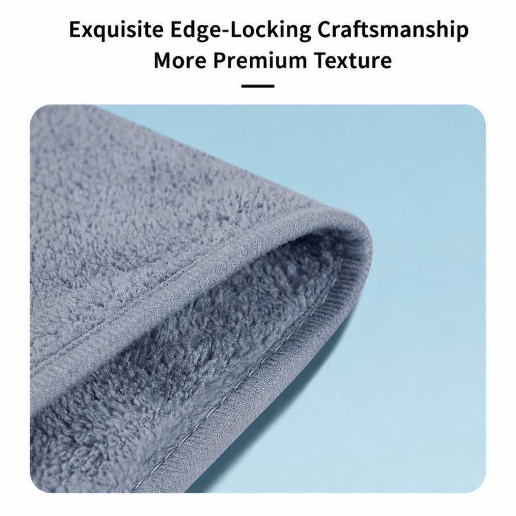 Thick gray towel with sealed edge stitching and plush loop texture detail