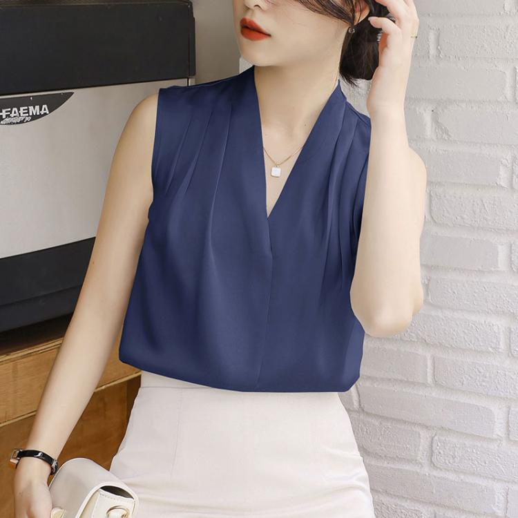 Navy sleeveless satin V-neck blouse with fluid fit and gathered center panel