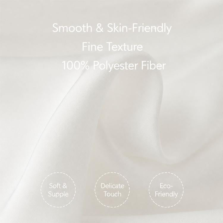 White satin fabric close-up with fine smooth sheen for a women's blouse