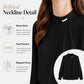 Black mock neck chiffon blouse with three pearl buttons at collar, long sleeves