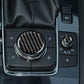 Installed black carbon fiber multimedia knob cover with silver ring trim