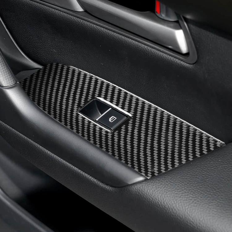Carbon-fiber window lift panel sticker featuring black textured pattern over door switch area.