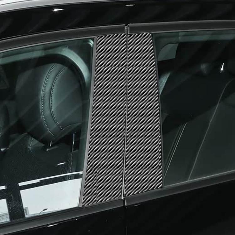 Installed carbon-pattern B-pillar stickers on a car door edge