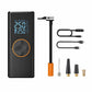 Black electric tire pump with digital display, orange control button, and multiple nozzle tips