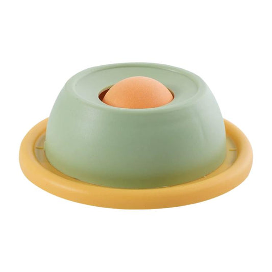 Rotating slow feeder cat treat bowl puzzle toy with green cup and orange ball, yellow base