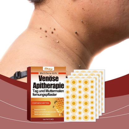 Hydrating care patches on skin near small dark spots