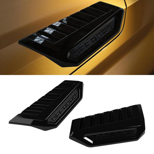 Glossy black hood vent cover pair with ribbed channels and embossed OFF ROAD