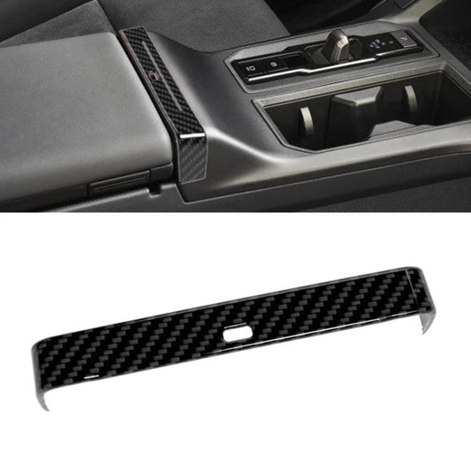 Toyota RAV4 armrest box trim strip with carbon fiber pattern and center opening