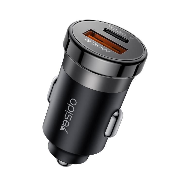Black 30W car charger with single USB-A port and Type-C port, compact round head