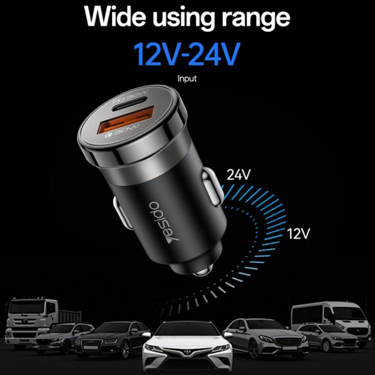 Black car charger with USB-A and Type-C ports, angled close-up