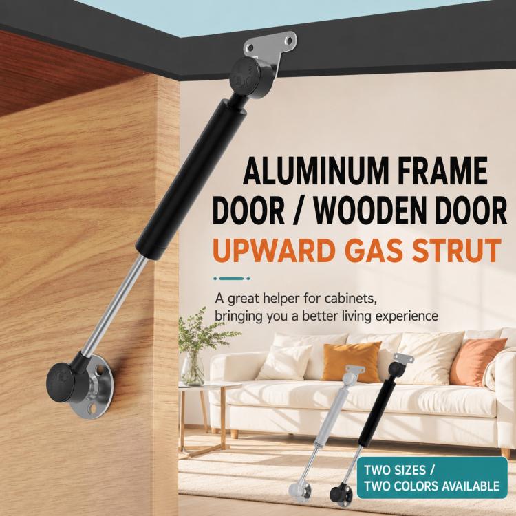 Cabinet gas strut lift support installed on a wooden door with aluminum frame