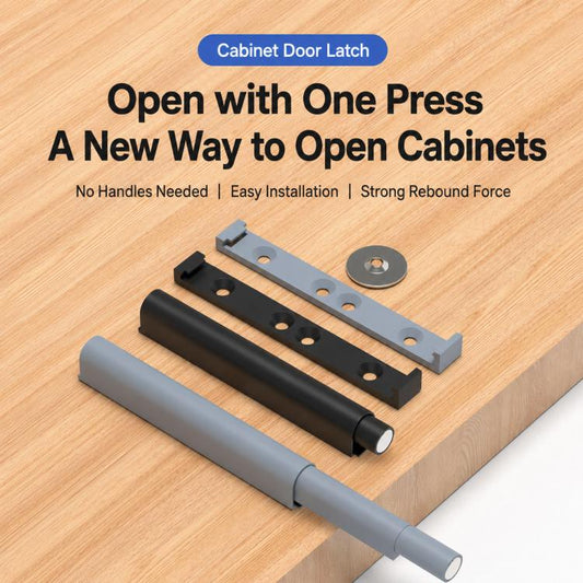 Cabinet door rebound latch pieces in gray and black on a wood cabinet surface
