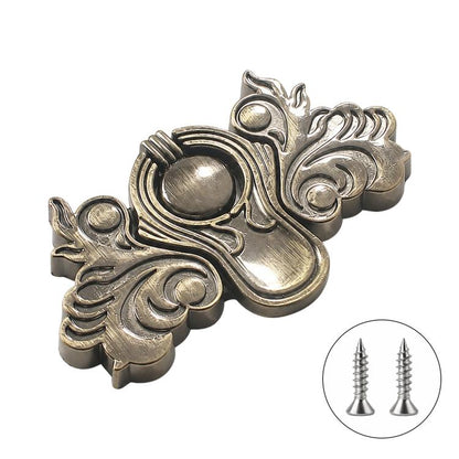 Butterfly-shaped metal pull handle in brushed bronze finish, with mounting screws