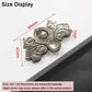 Butterfly-shaped metal pull handle in brushed bronze finish