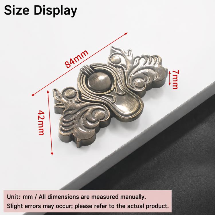 Butterfly-shaped metal pull handle in brushed bronze finish