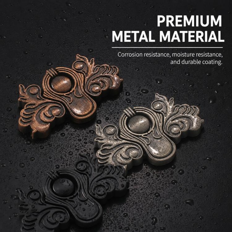 Butterfly-shaped metal pull handles in bronze, silver, and black finishes