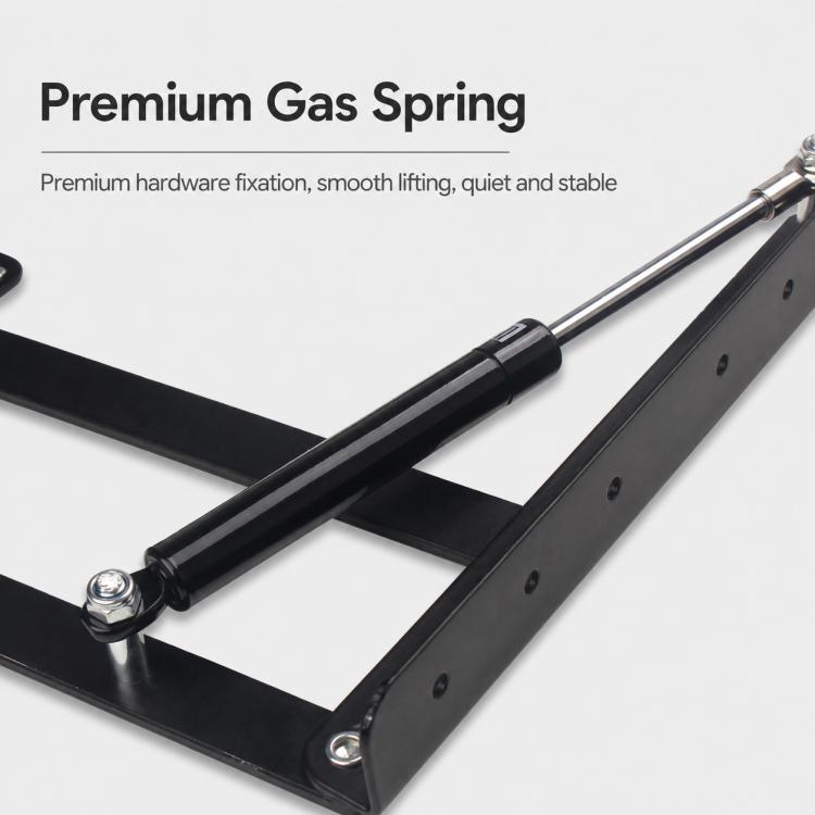 Black gas spring lift bracket with steel plates and mounting holes, close-up
