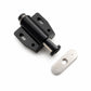 Black cabinet door latch with metal mounting plate and silver striker plate