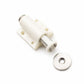 Beige handle-free cabinet door latch with round metal striker and mounting plate
