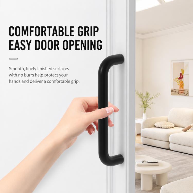 Black aluminum cabinet pull handle with comfortable hand grip on a door
