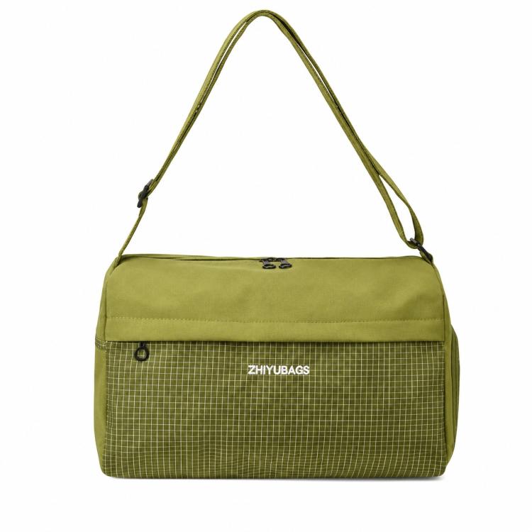 Green grid-panel crossbody gym handbag with top handle straps and zipper closure