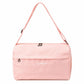 Pink grid-panel crossbody gym handbag with top handle straps and zipper closure