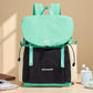 Lightweight canvas backpack with front flap, mint green top and black front panel