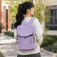 Purple backpack with front flap and adjustable shoulder straps