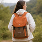 Orange and brown backpack with front flap and side draw cords