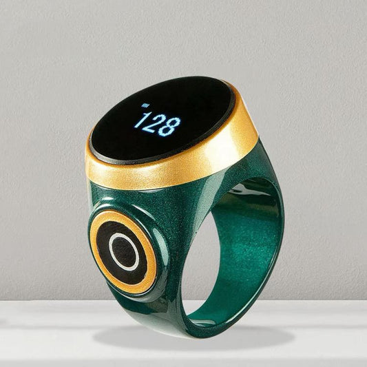 Smart Bluetooth prayer counter ring, emerald green band with black OLED display showing 128