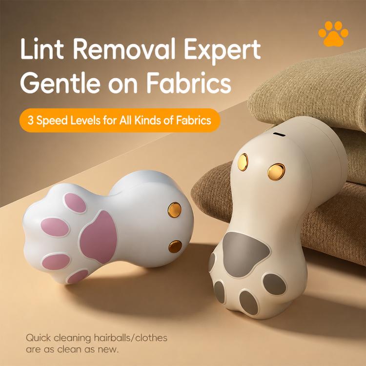 Electric lint remover with cat paw head, showing white and khaki-yellow versions