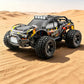1:18 scale 4WD brushless RC car with black body, orange graphic accents, and front LED lights