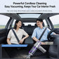 Handheld car vacuum used inside a vehicle, with purple-accented nozzle