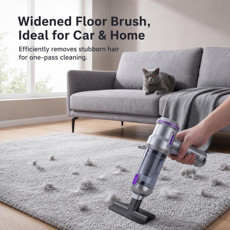 Handheld vacuum with widened floor brush head cleaning a carpeted floor