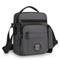 Gray men's crossbody bag with front zip pocket and top carry handle