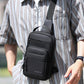 Men's black waterproof crossbody chest bag with zip front pockets and adjustable strap
